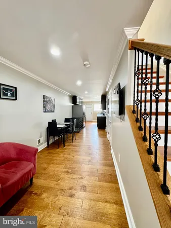 a living room with furniture and a table