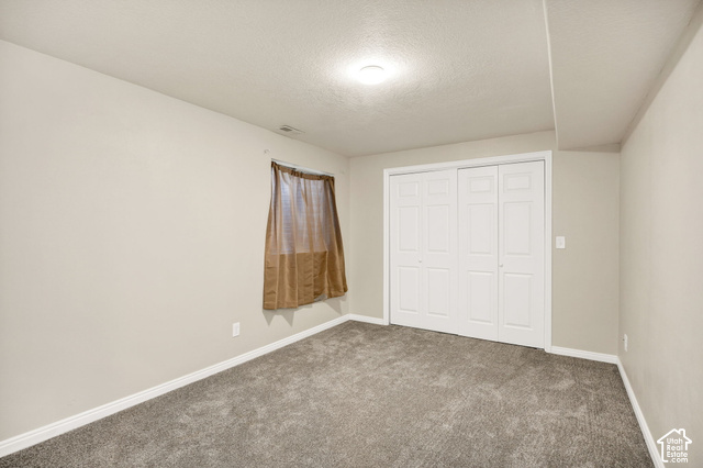 1143 East Mountain Road Logan, UT 84321 - Photo 38 of 64 Neutral wall finish, ceiling-mounted light fixture, and window