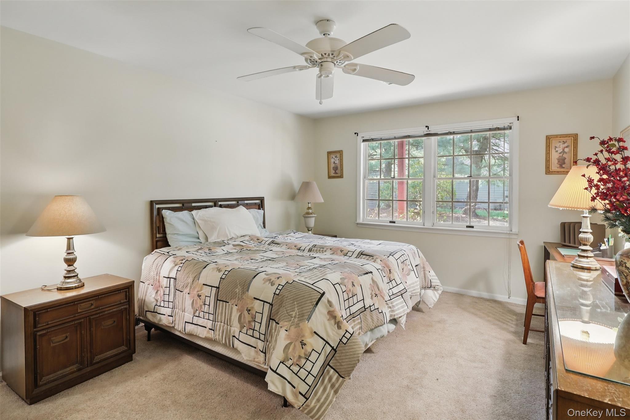 21 Lamplight Street Beacon, NY 12508 - Photo 14 of 26 a bedroom with a bed and window