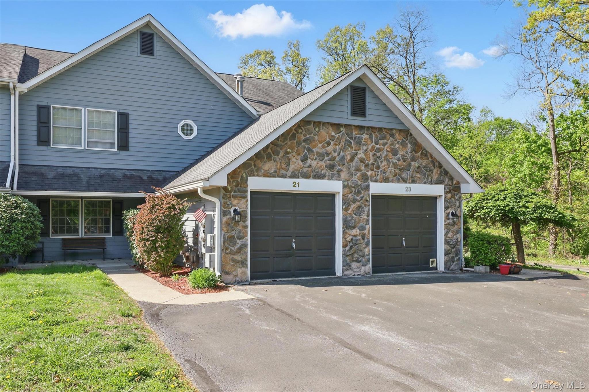 21 Lamplight Street Beacon, NY 12508 - Photo 2 of 26 a view of a house with yard and plants