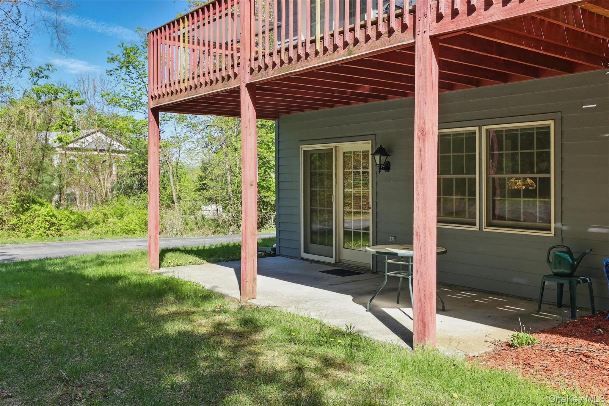 21 Lamplight Street Beacon, NY 12508 - Photo 22 of 26 a view of a house with backyard and porch