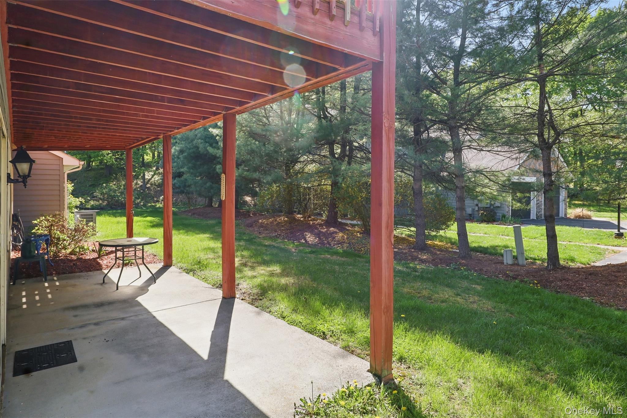 21 Lamplight Street Beacon, NY 12508 - Photo 25 of 26 a view of a porch with a backyard
