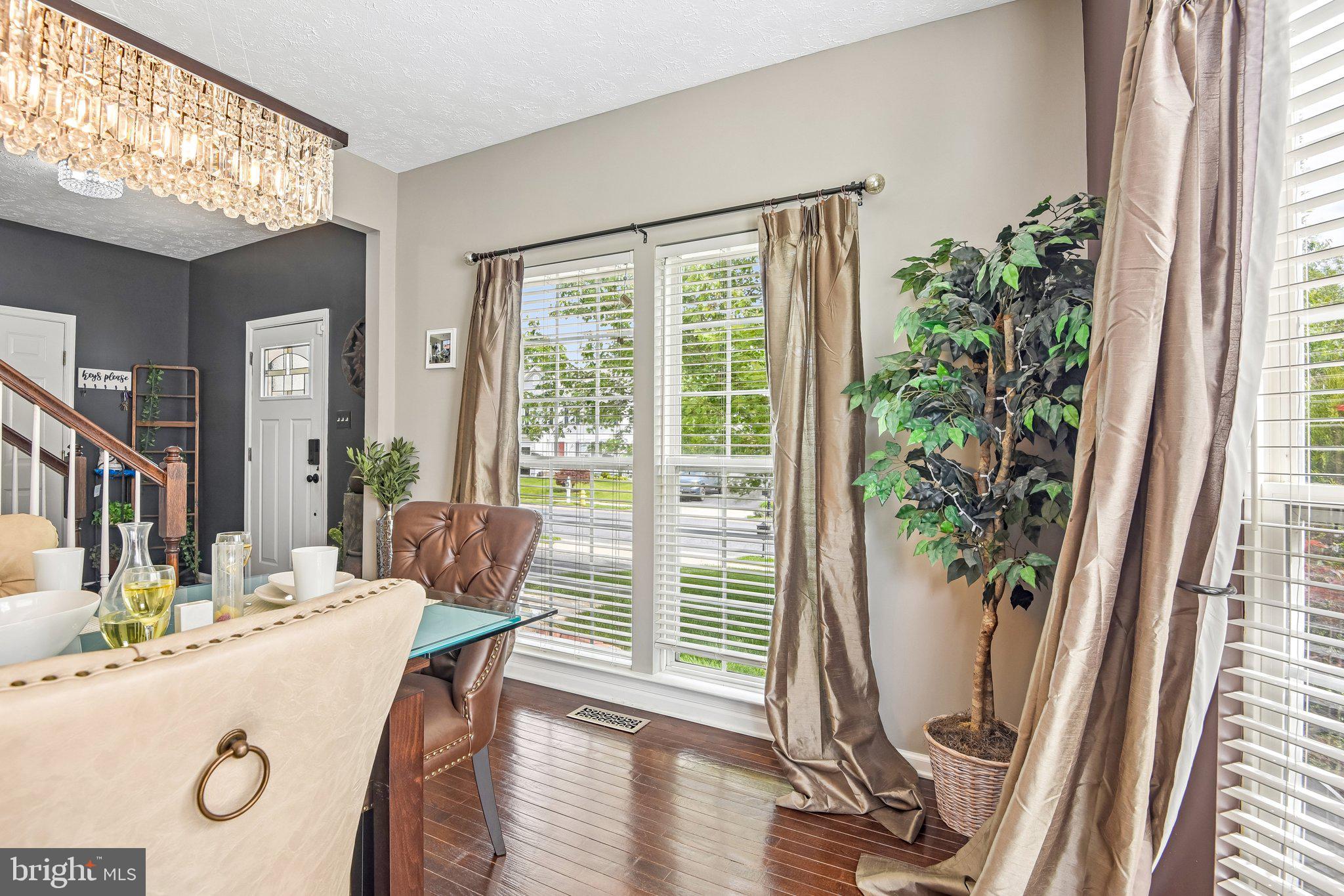 306 Watertons Way Joppa, MD 21085 - Photo 18 of 50 a view of a dining room with furniture and wooden floor