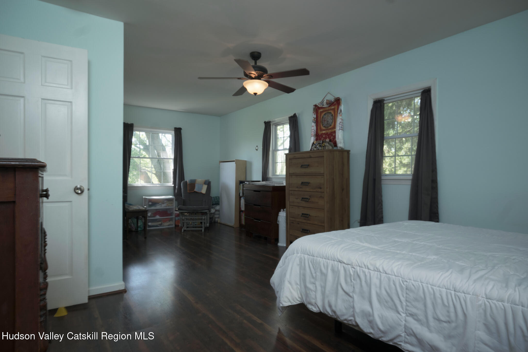 2226 County Rte 27 Hudson, NY 12534 - Photo 15 of 30 a bedroom with a bed and wooden floor