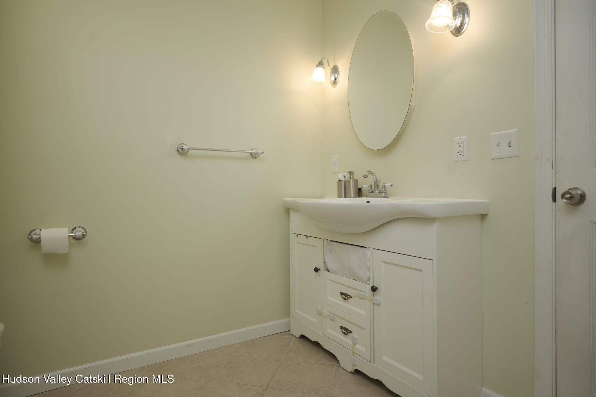 2226 County Rte 27 Hudson, NY 12534 - Photo 19 of 30 a bathroom with a sink and a mirror