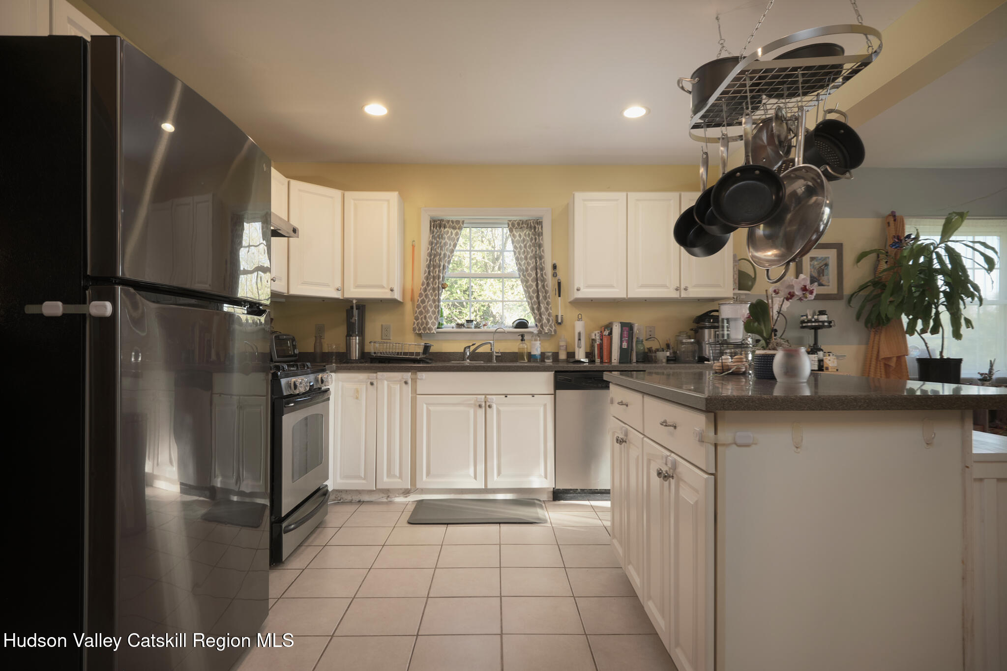 2226 County Rte 27 Hudson, NY 12534 - Photo 6 of 30 a kitchen with a refrigerator and a sink