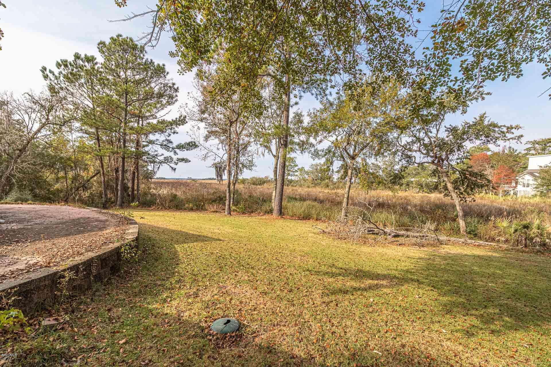 4913 Ridgewood Drive Moss Point, MS 39563 - Photo 7 of 37 Outside back 1.2