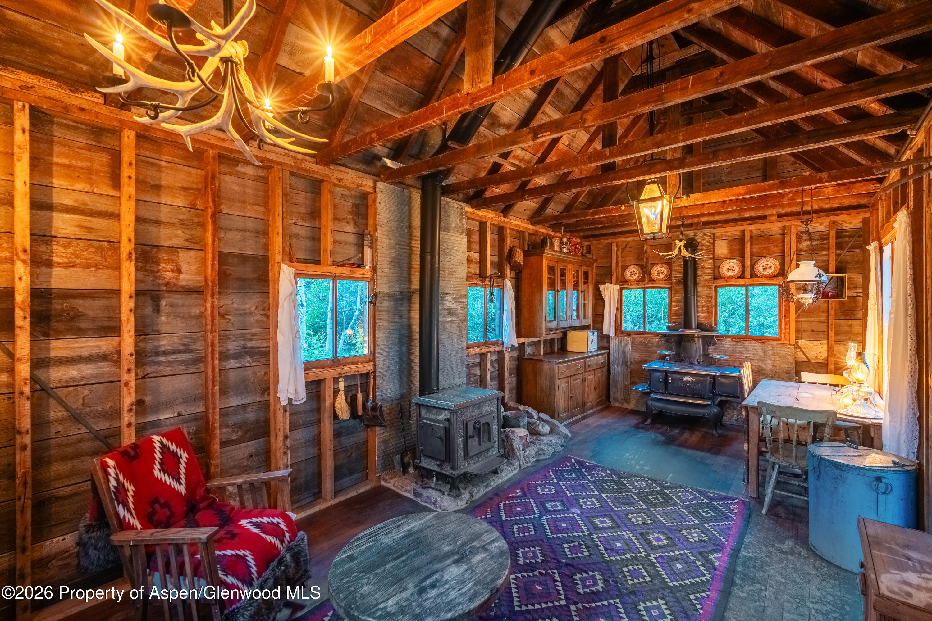 1350 Old Herron Road Basalt, CO 81621 - Photo 35 of 81 a living room with furniture and a floor to ceiling window