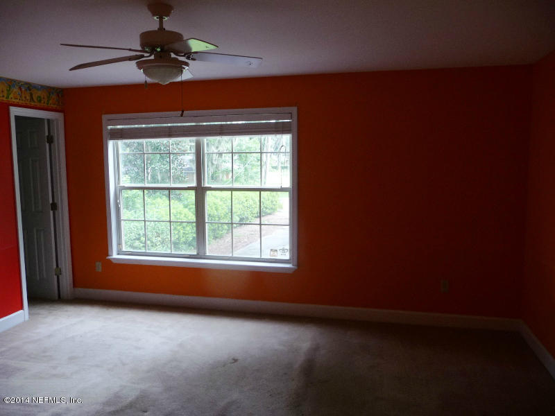 3049 Front Road Jacksonville, FL 32257 - Photo 8 of 30 an empty room with a window