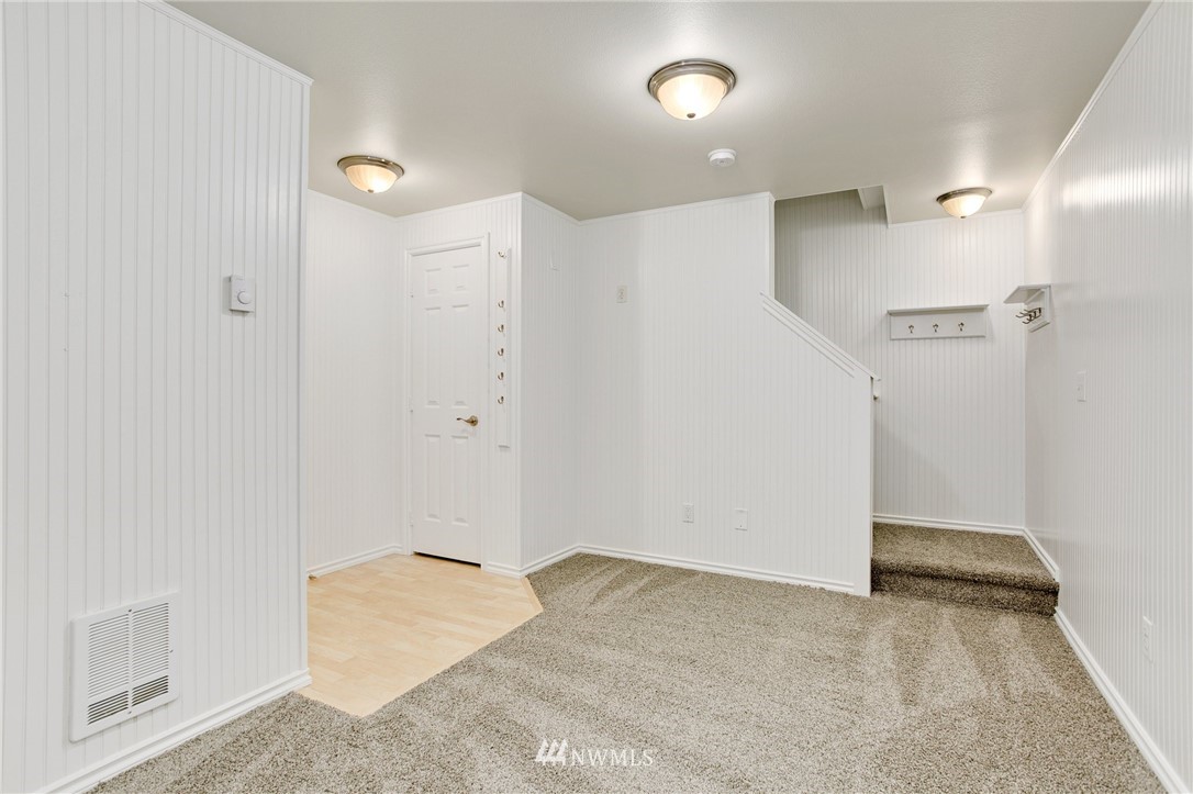 23317 Edmonds Way, Unit 8 Edmonds, WA 98026 - Photo 20 of 26 a view of a big room with closet and windows