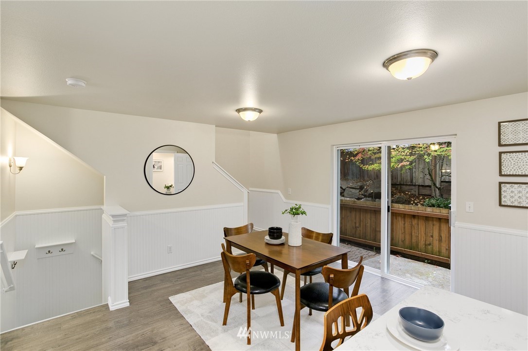 23317 Edmonds Way, Unit 8 Edmonds, WA 98026 - Photo 9 of 26 a view of a dining room and wooden floor