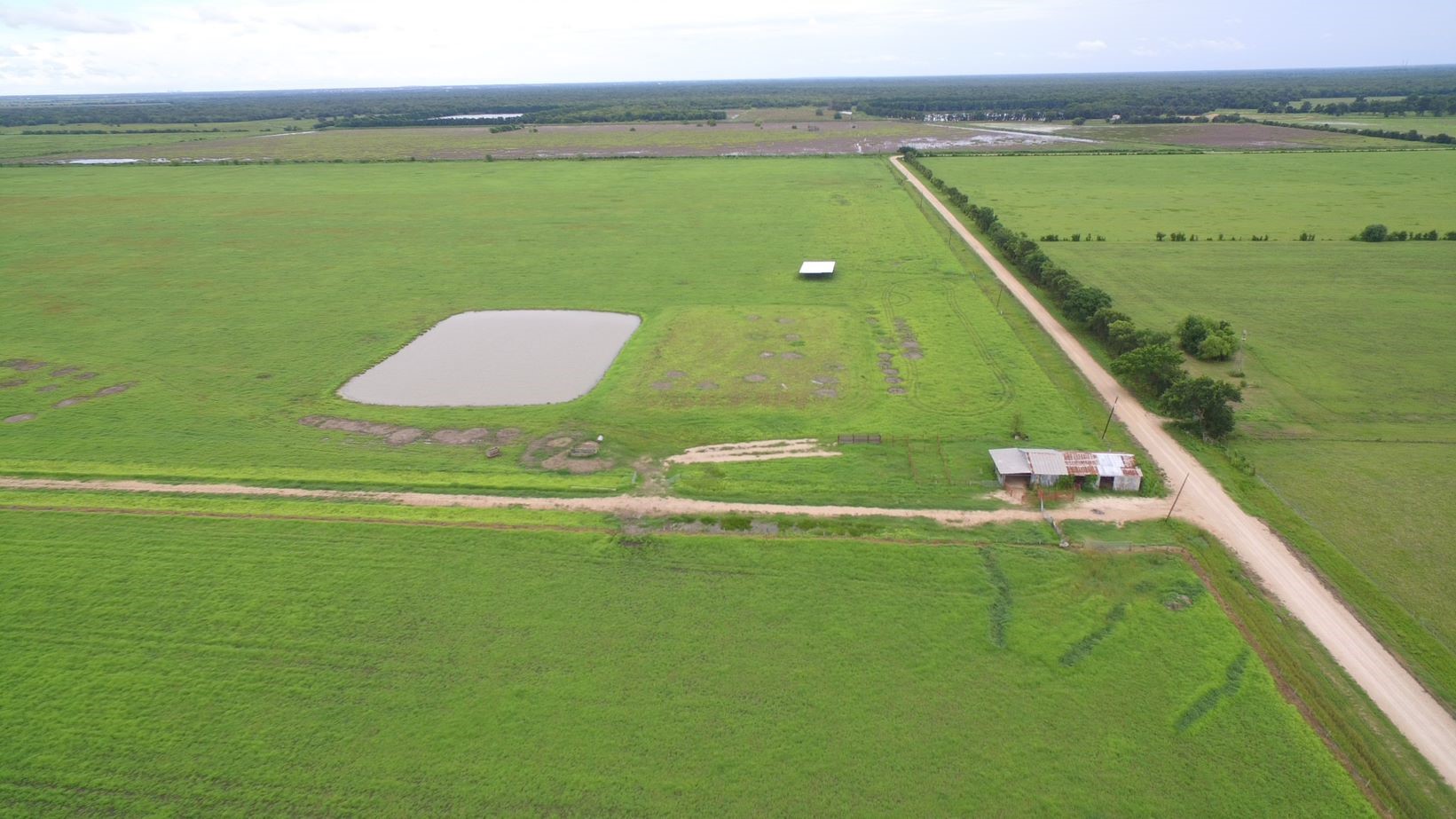 4950 Donaldson Road Wharton, TX 77488 - Photo 7 of 17 Looking S at Barn and CR 119