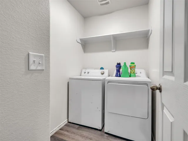 a utility room with dryer and washer