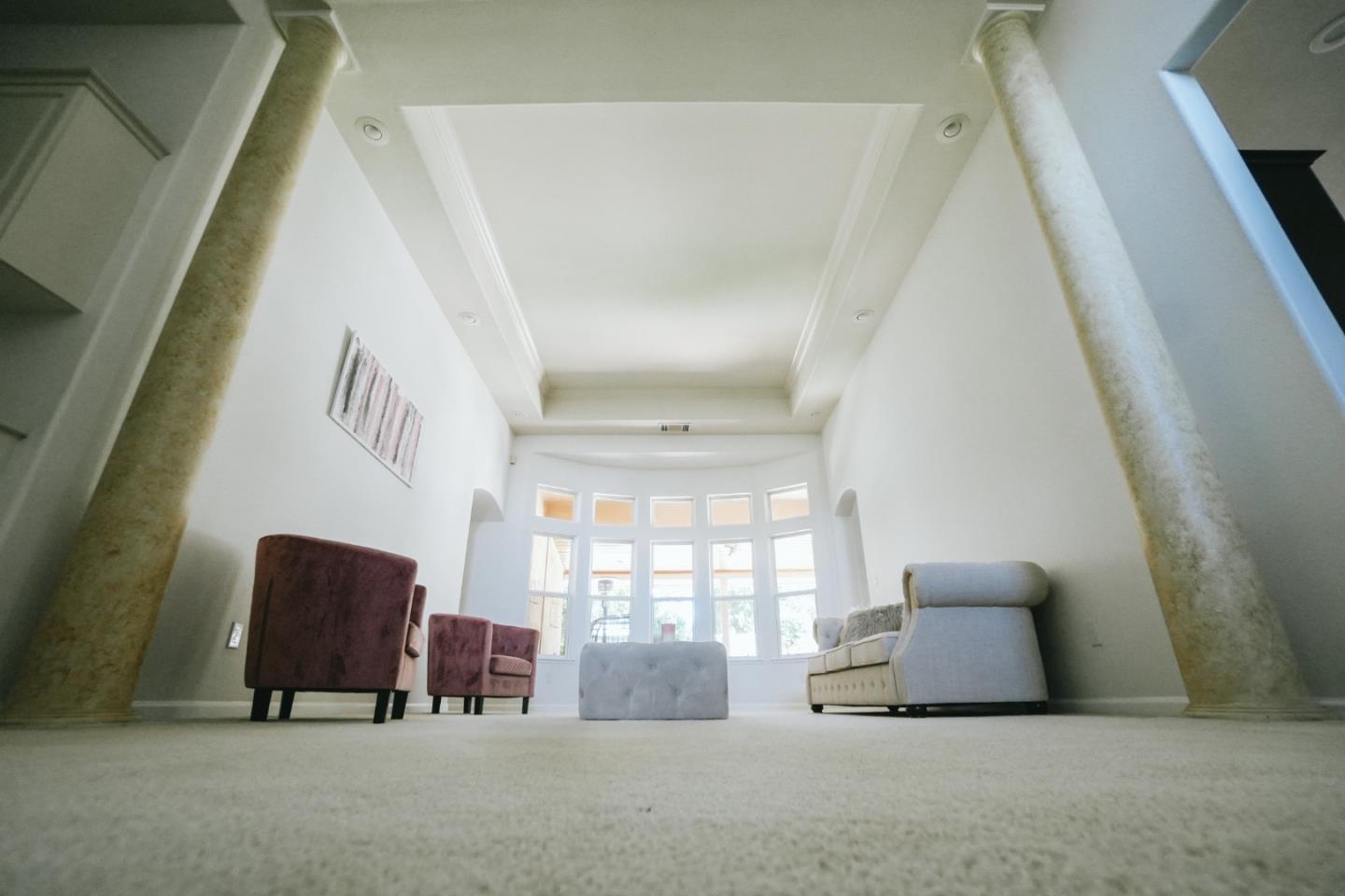 4609 Vía Fiori Modesto, CA 95357 - Photo 12 of 44 a living room with furniture and a window