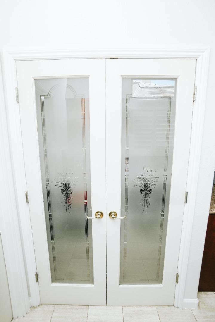 4609 Vía Fiori Modesto, CA 95357 - Photo 35 of 44 wooden view of a bathroom from a hallway