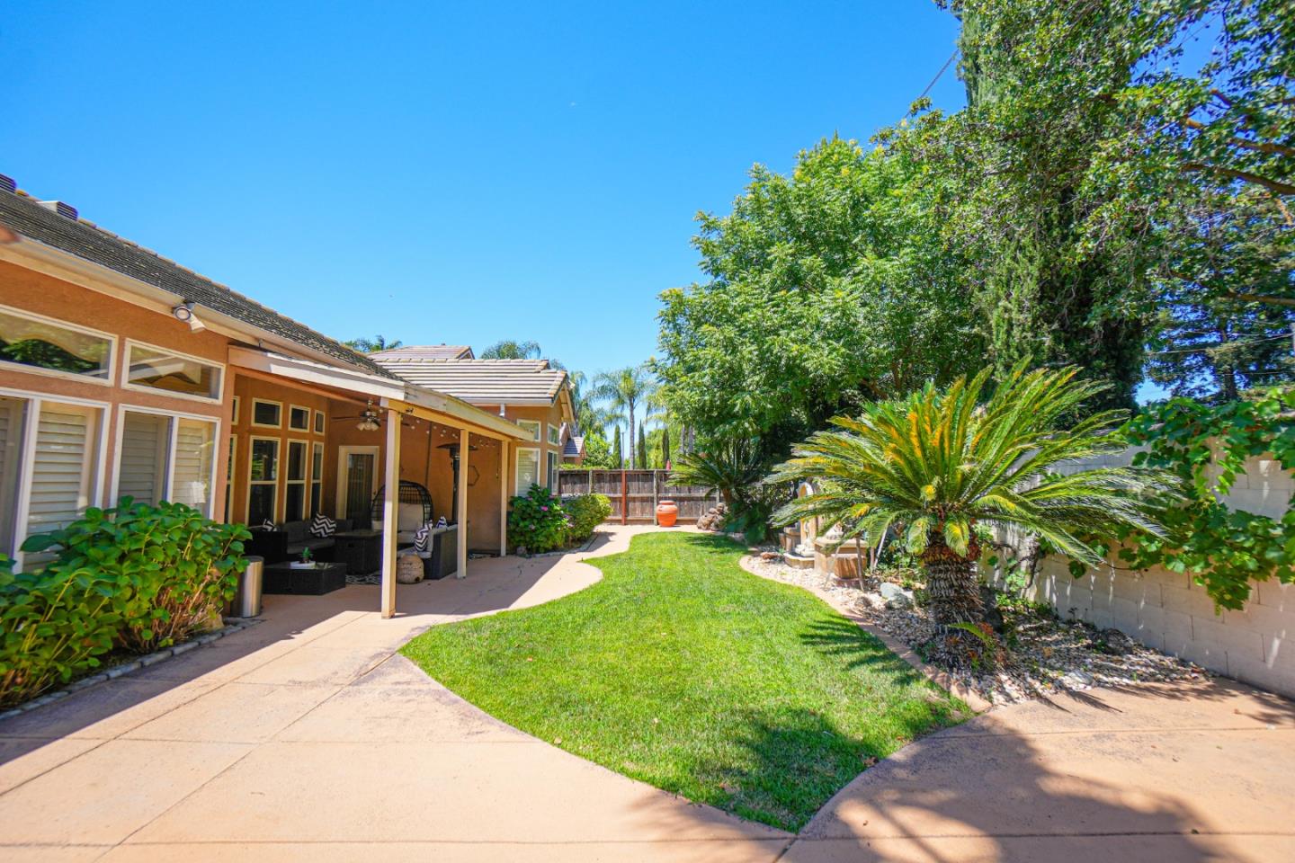 4609 Vía Fiori Modesto, CA 95357 - Photo 40 of 44 a front view of house and yard with green space