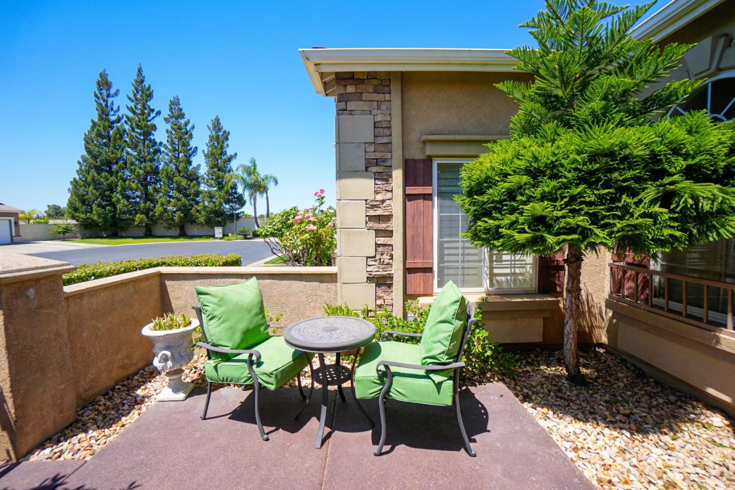 4609 Vía Fiori Modesto, CA 95357 - Photo 4 of 44 a view of a chair and table in backyard of the house
