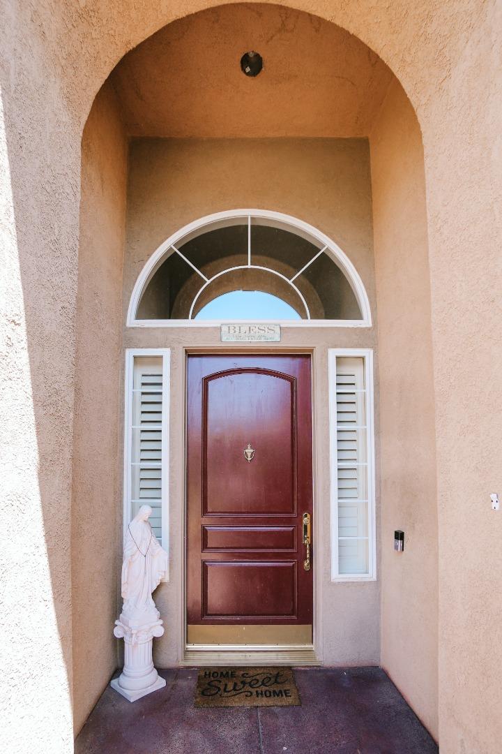 4609 Vía Fiori Modesto, CA 95357 - Photo 5 of 44 a view of entryway with wooden floor