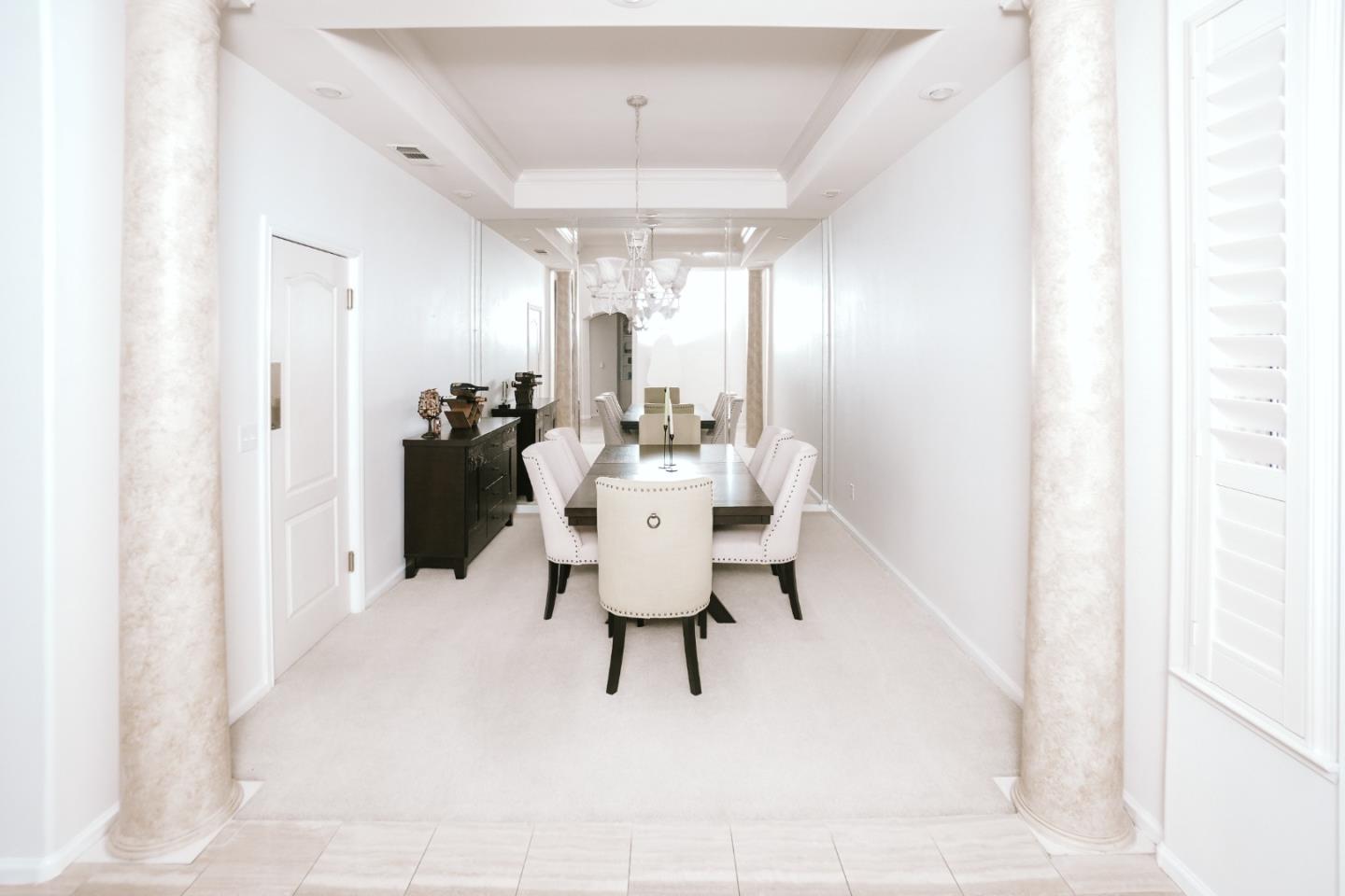 4609 Vía Fiori Modesto, CA 95357 - Photo 6 of 44 a dining room with furniture and window