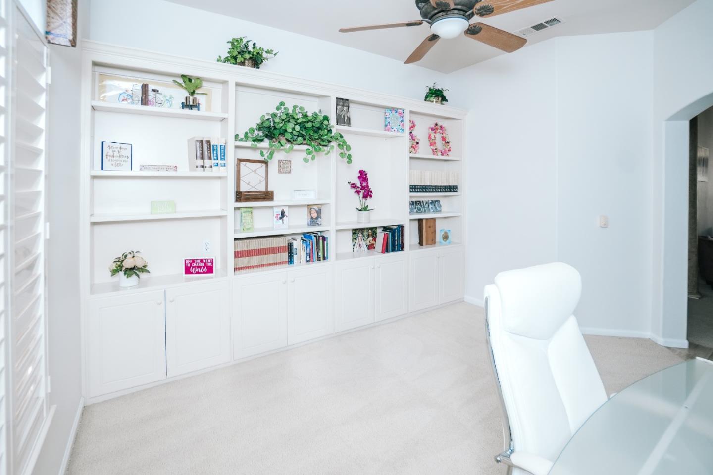 4609 Vía Fiori Modesto, CA 95357 - Photo 9 of 44 a bathroom with a sink vanity mirror and toilet