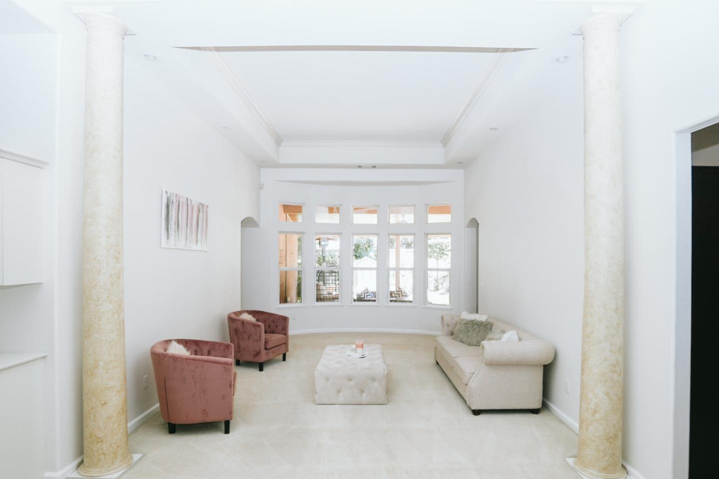 4609 Vía Fiori Modesto, CA 95357 - Photo 10 of 44 a living room with furniture and a large window