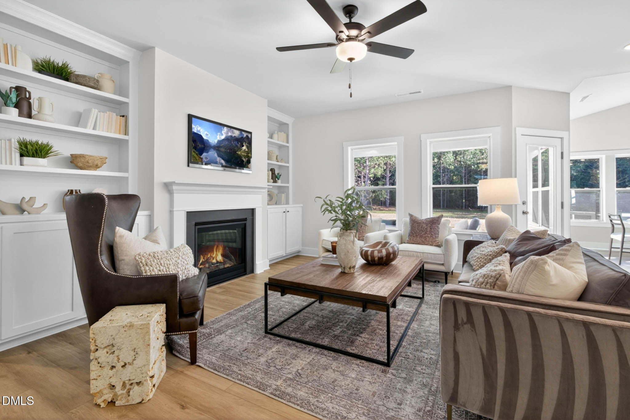 778 Beacon Hl Road Lillington, NC 27546 - Photo 9 of 44 a living room with furniture fireplace and flat screen tv
