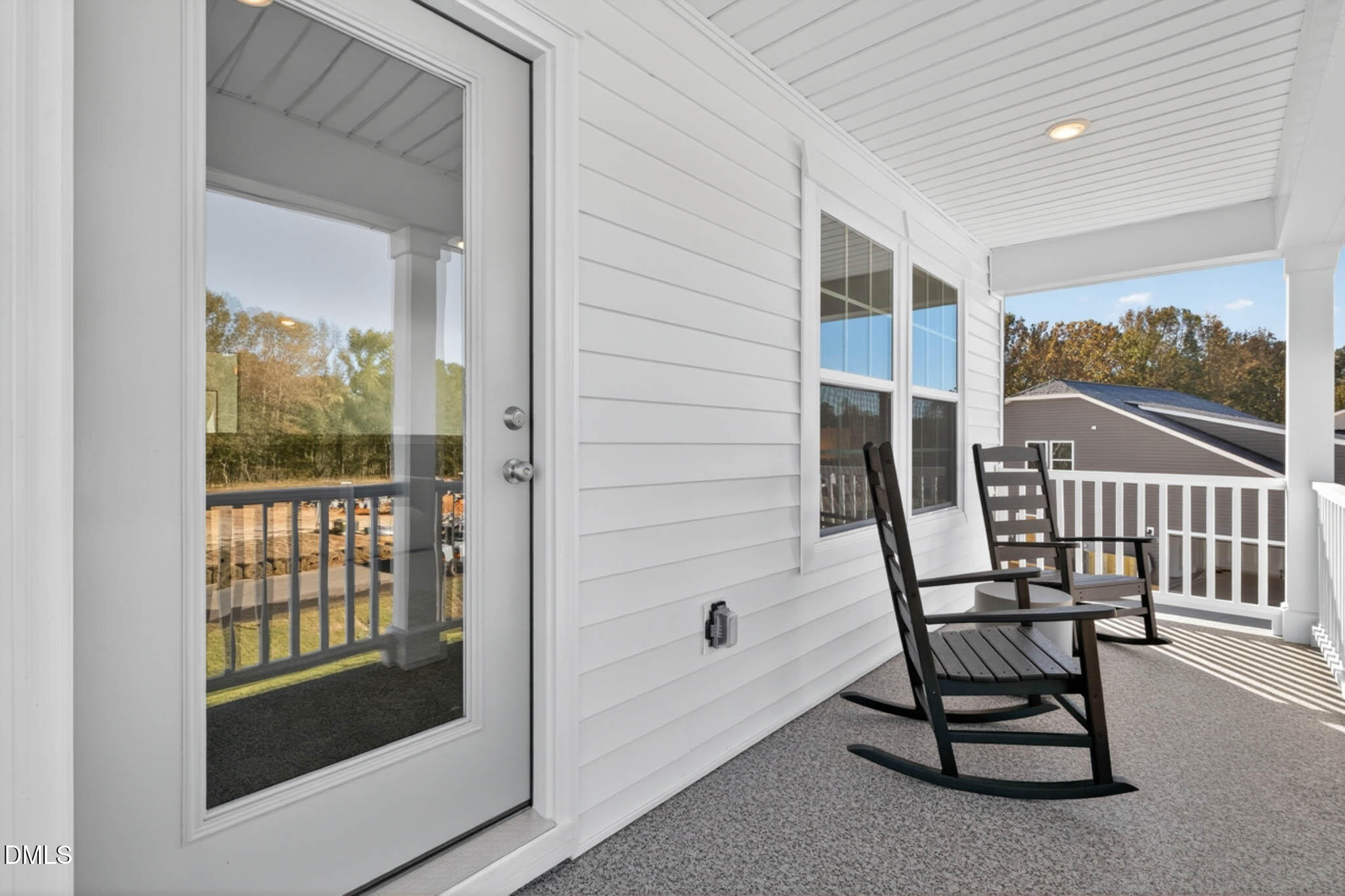 778 Beacon Hl Road Lillington, NC 27546 - Photo 27 of 44 a view of a hallway with a door and wooden floor