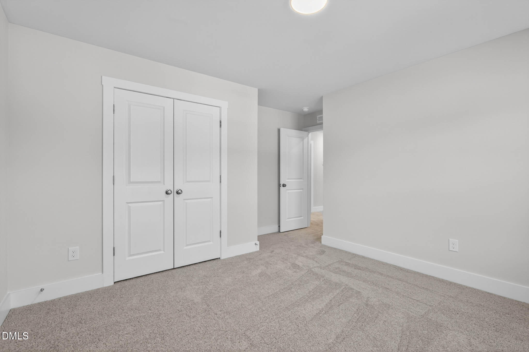 778 Beacon Hl Road Lillington, NC 27546 - Photo 33 of 44 a view of an empty room and closet area