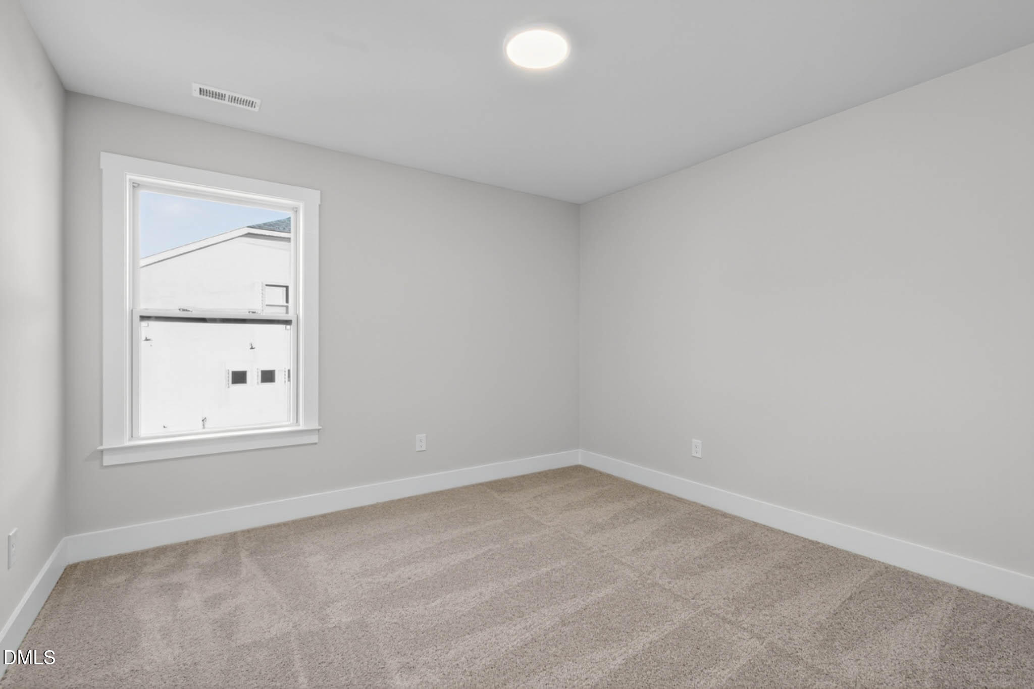 778 Beacon Hl Road Lillington, NC 27546 - Photo 36 of 44 an empty room with a window