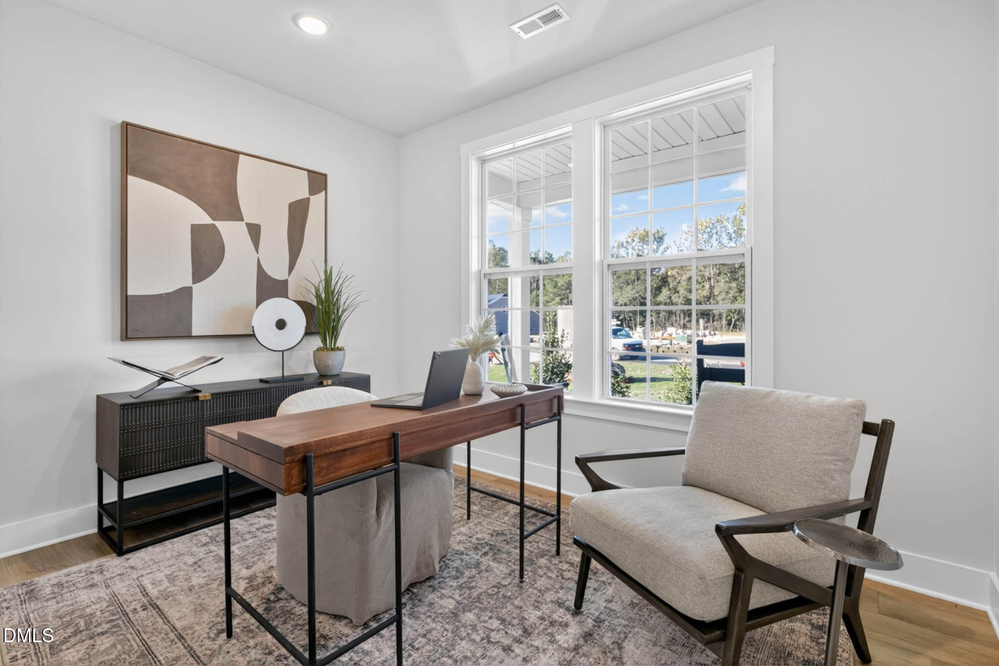 778 Beacon Hl Road Lillington, NC 27546 - Photo 7 of 44 a work room with furniture and a window