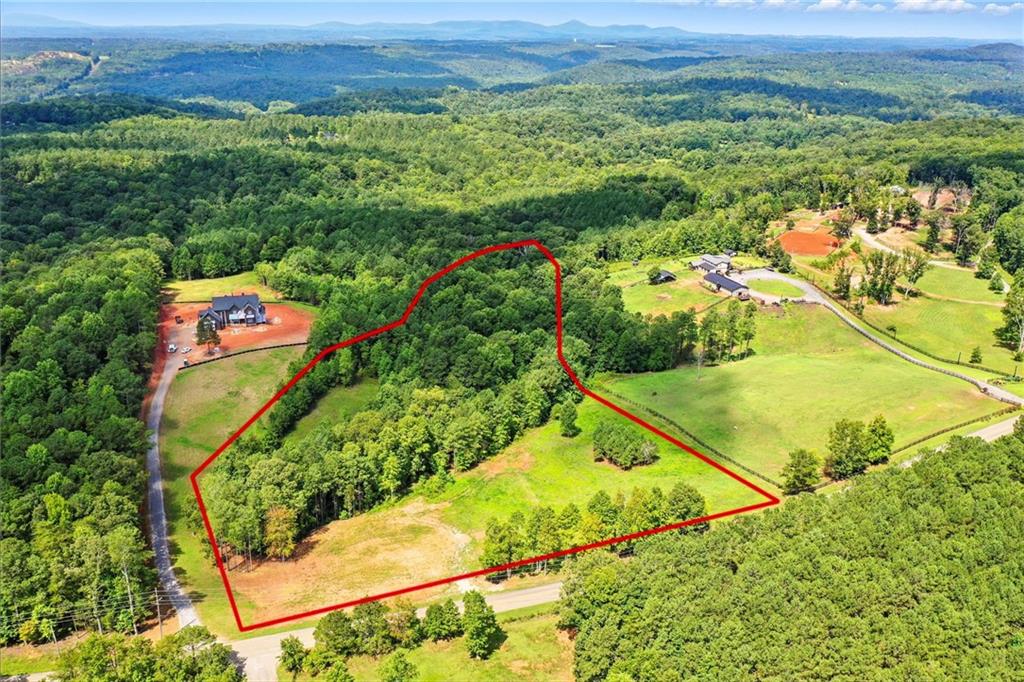 a view of a yard with an ocean