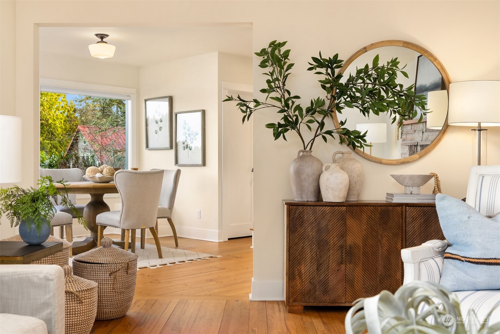 8260 Northeast Hidden Cove Road Bainbridge Island, WA 98110 - Photo 12 of 35 a living room with furniture and a potted plant