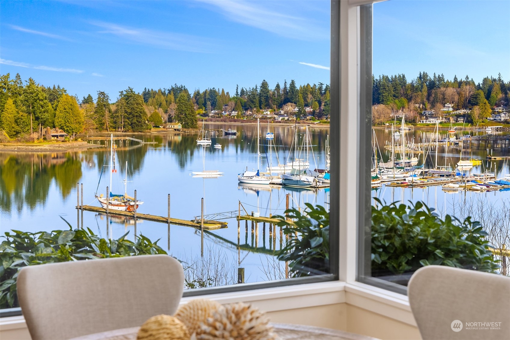 8260 Northeast Hidden Cove Road Bainbridge Island, WA 98110 - Photo 14 of 35 a view of a balcony with lake view and mountain view