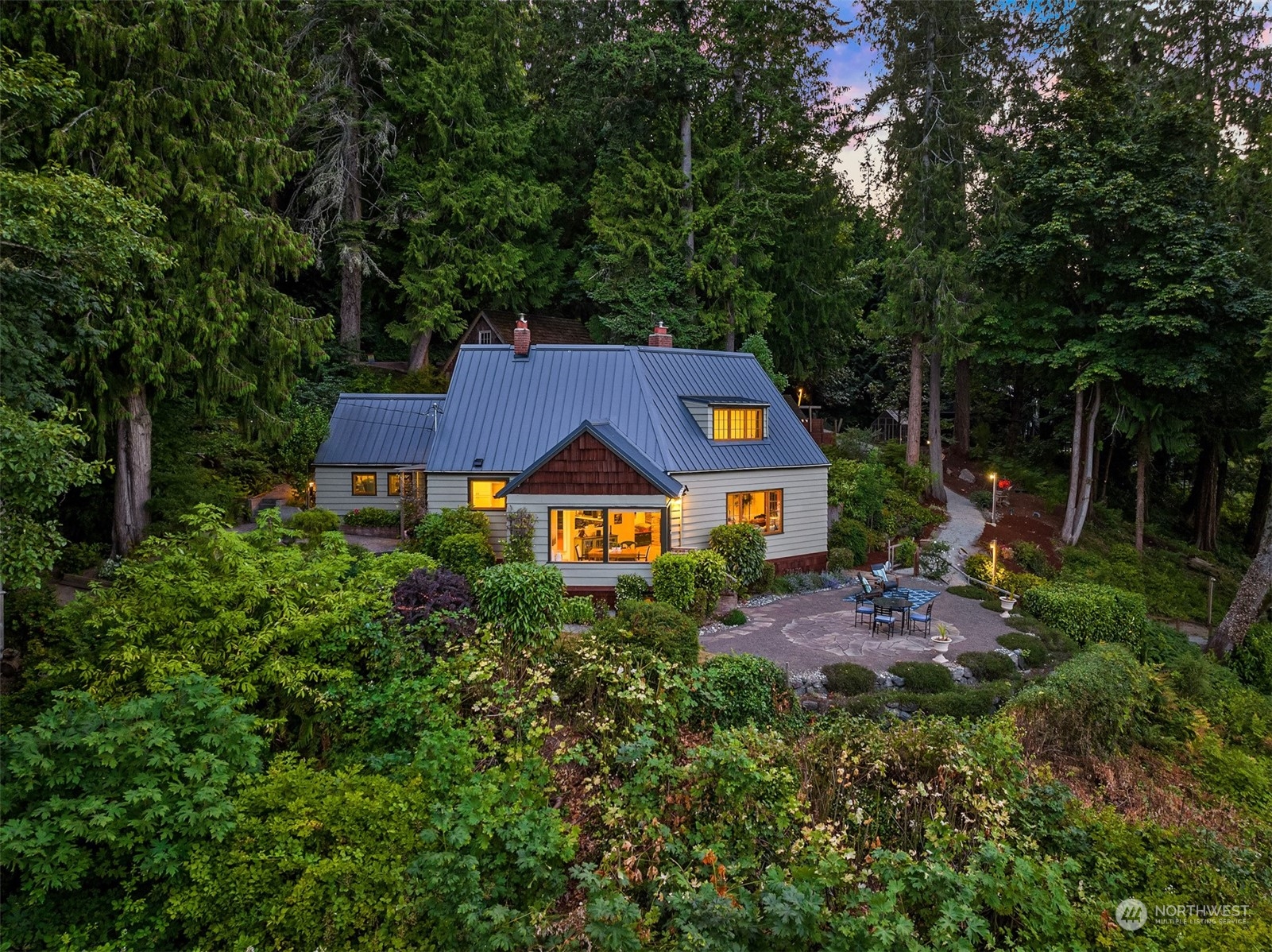 8260 Northeast Hidden Cove Road Bainbridge Island, WA 98110 - Photo 5 of 35 an aerial view of a house