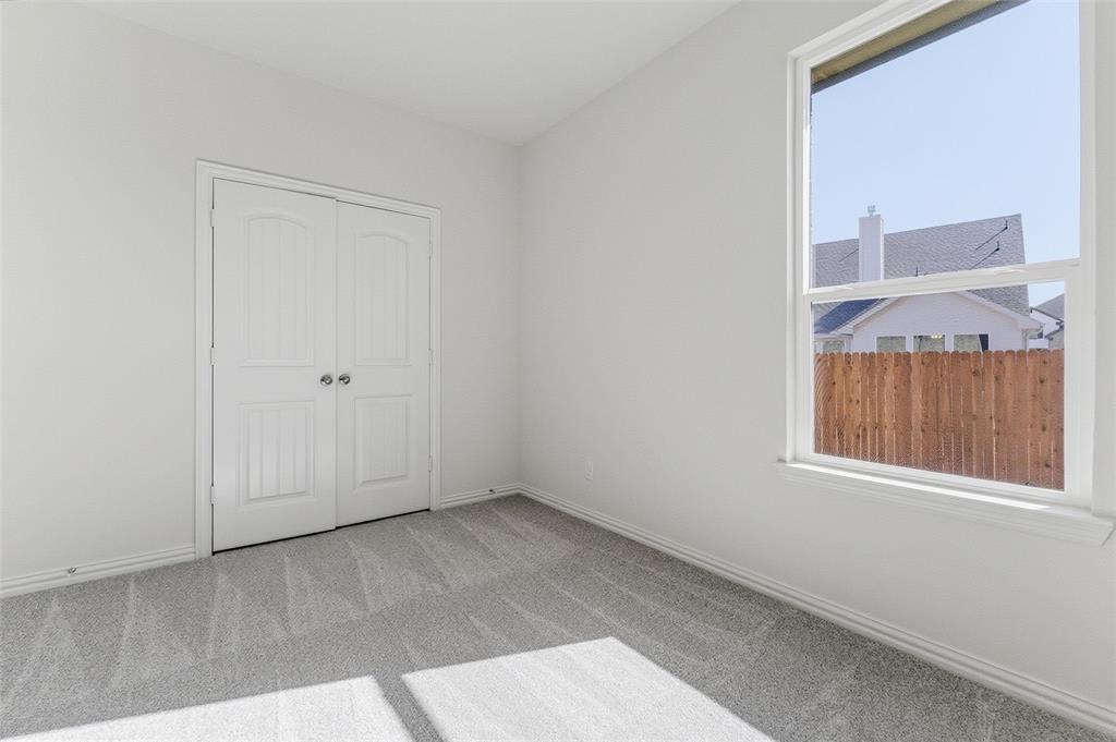 14408 Shooting Star Drive Haslet, TX 76052 - Photo 14 of 25 an empty room with a window