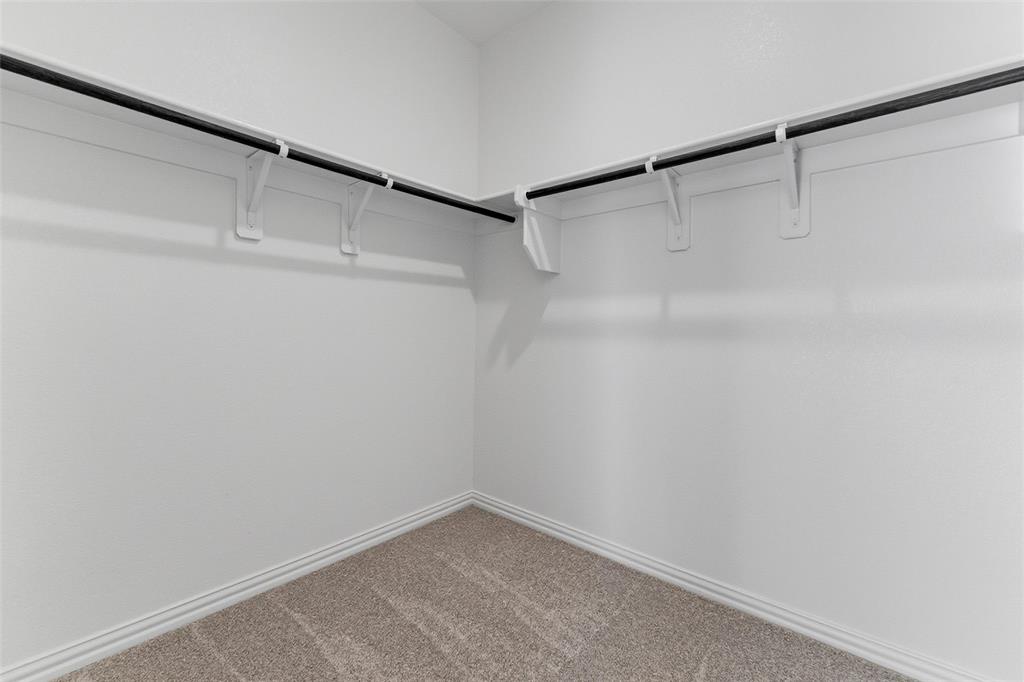 14408 Shooting Star Drive Haslet, TX 76052 - Photo 24 of 25 a view of an empty walk in closet