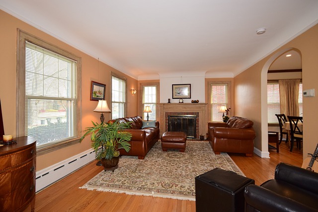 538 Byrd Road Riverside, IL 60546 - Photo 2 of 24 a living room with furniture fireplace and a window
