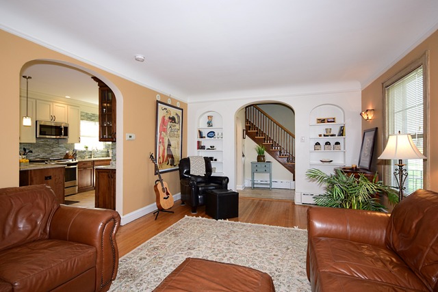 538 Byrd Road Riverside, IL 60546 - Photo 4 of 24 a living room with furniture fireplace and a large window