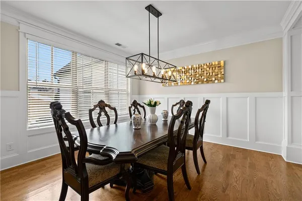 a kitchen with stainless steel appliances granite countertop a stove and a refrigerator