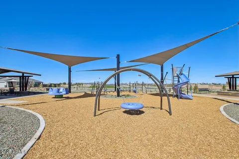 a view of a swimming pool and an outdoor space