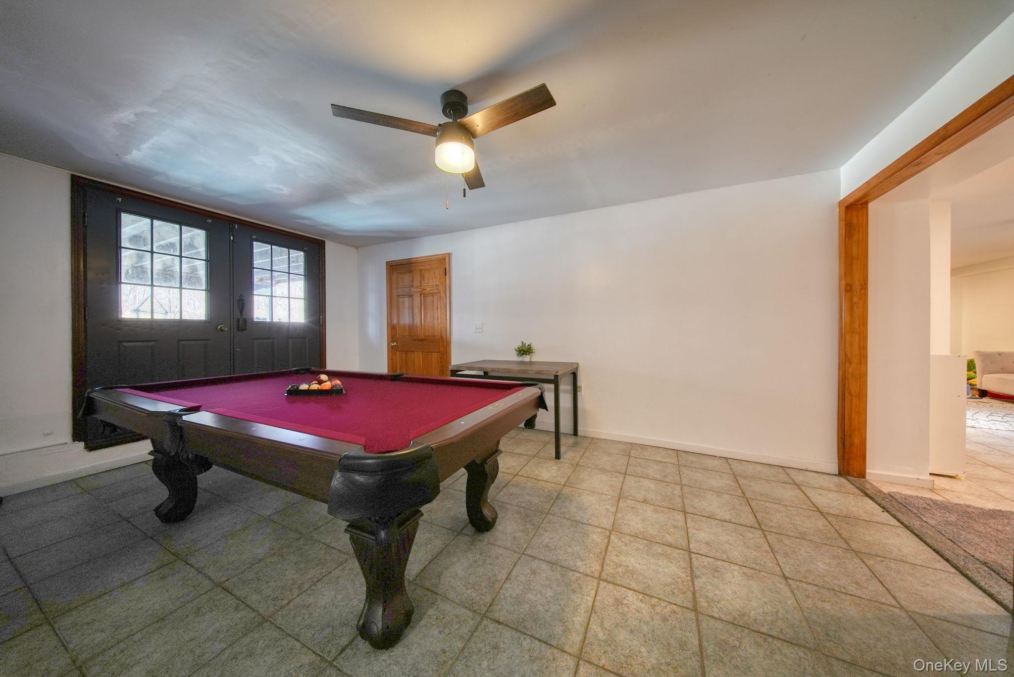 158 Wade Road Liberty, NY 12754 - Photo 24 of 40 a room with pool table and windows