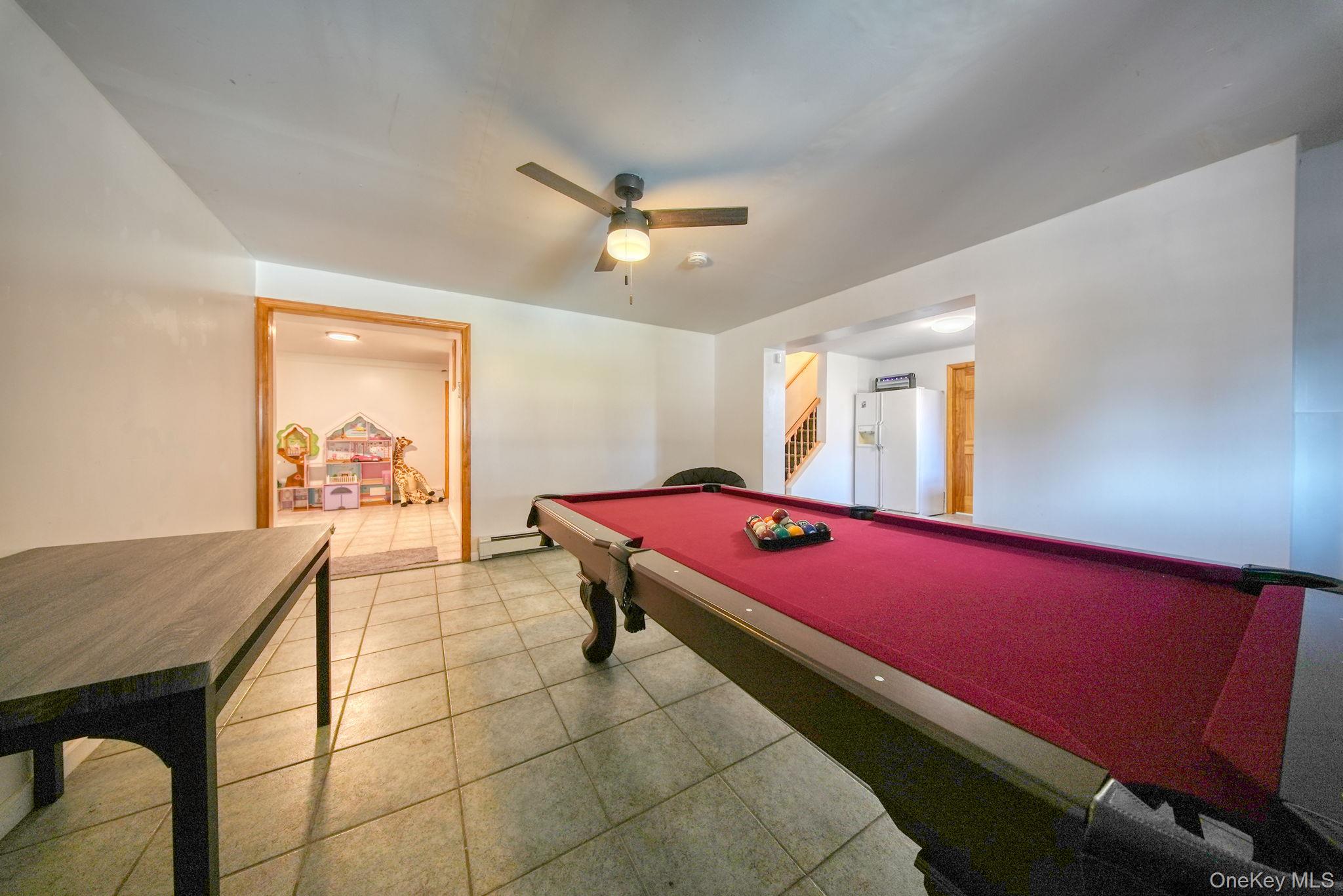 158 Wade Road Liberty, NY 12754 - Photo 25 of 40 a room with pool table and ceiling fan
