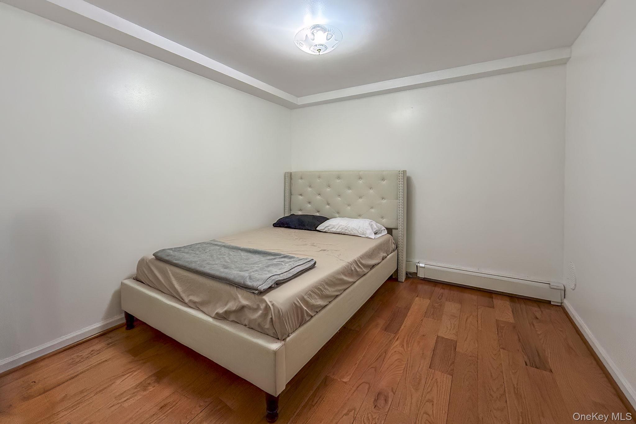 158 Wade Road Liberty, NY 12754 - Photo 31 of 40 a bedroom with a bed and a table