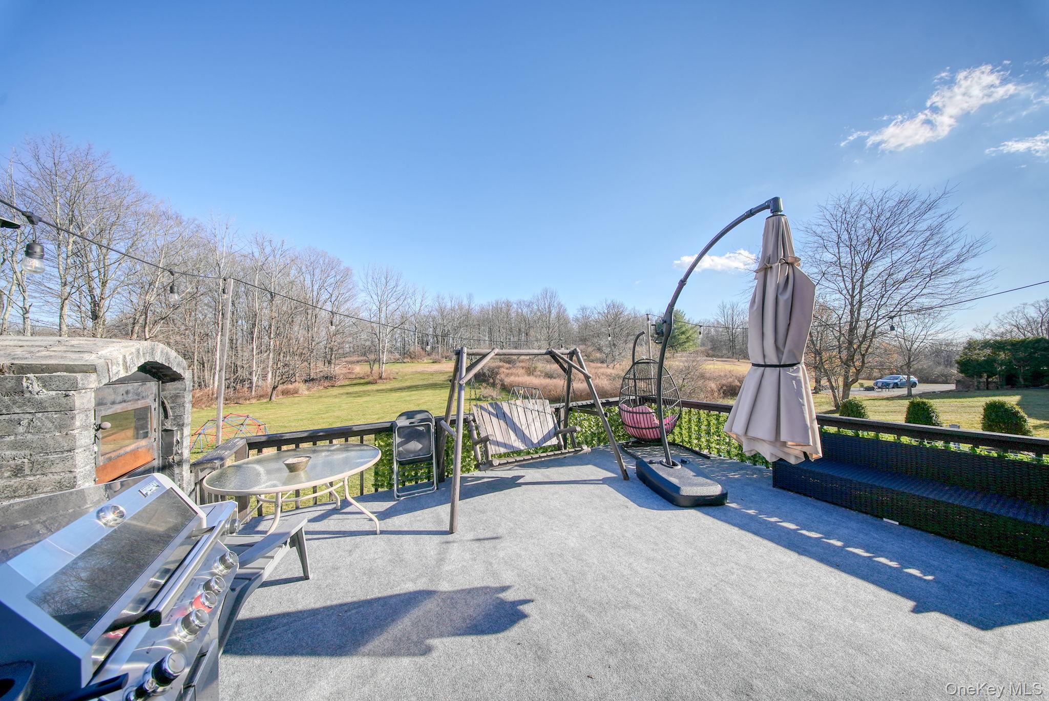 158 Wade Road Liberty, NY 12754 - Photo 34 of 40 a view of a swimming pool with a patio and a yard