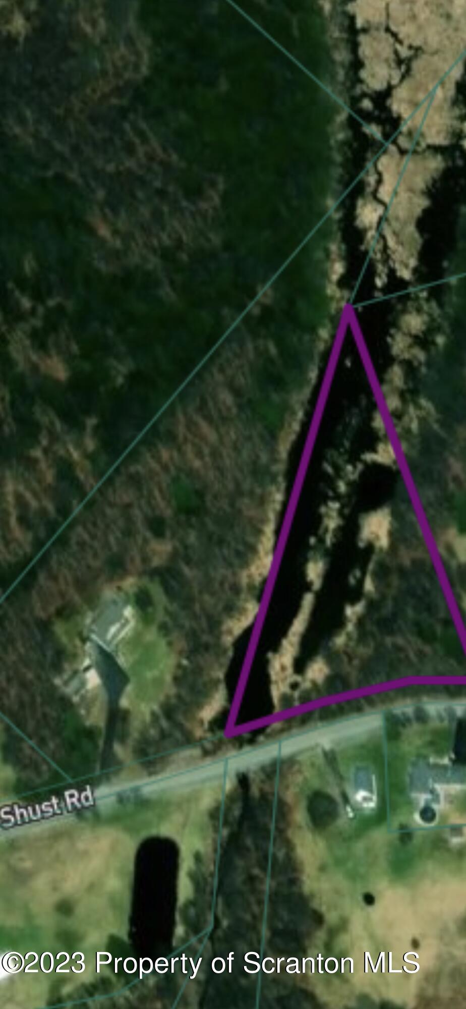 Shust Road Carbondale, PA 18407 - Photo 2 of 2 a view of a yard with a tree