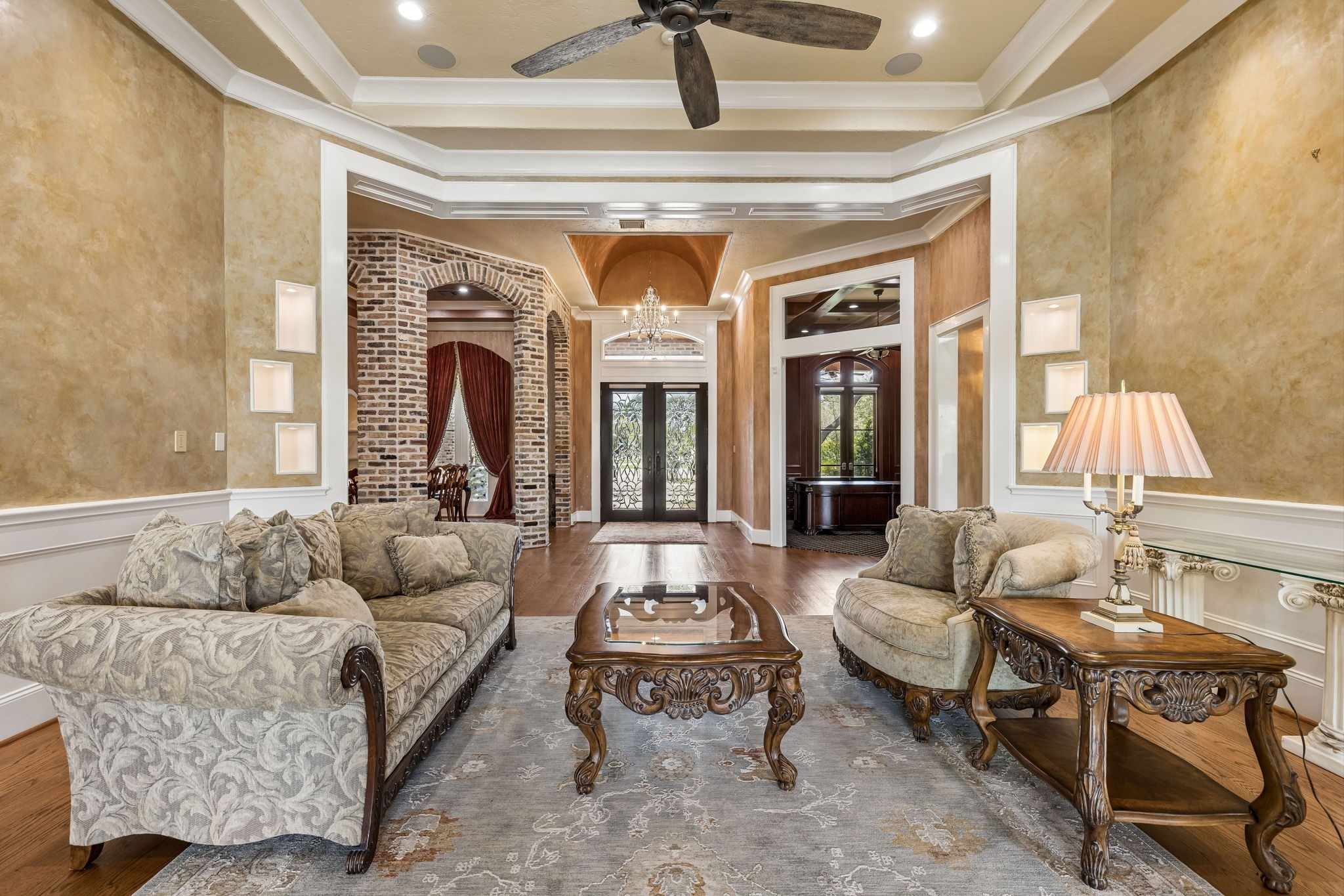 27306 Owosso Court Spring, TX 77386 - Photo 12 of 36 a living room with furniture and a fireplace