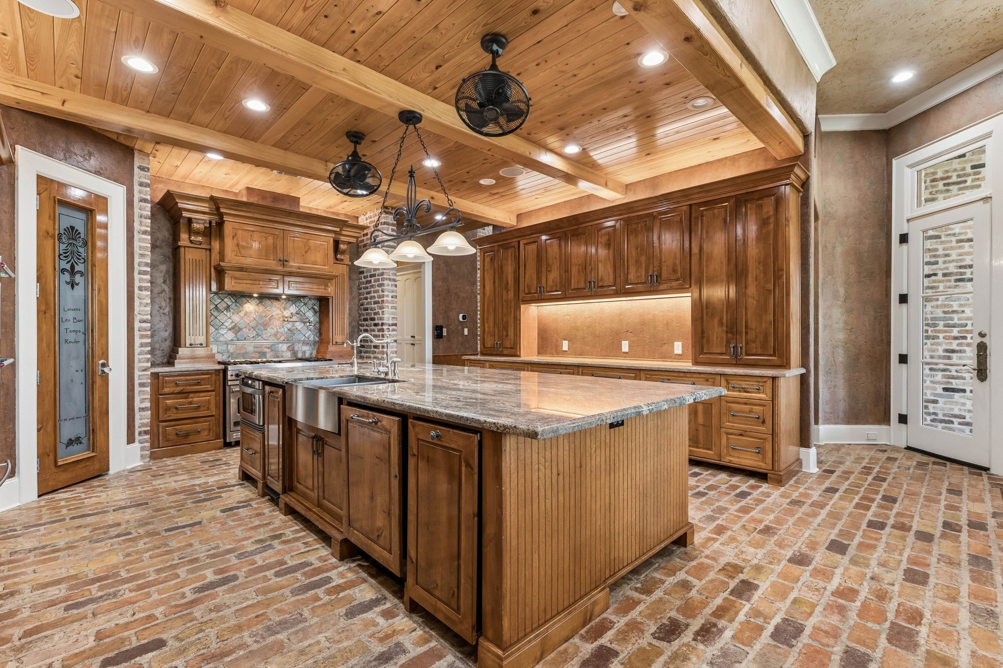 27306 Owosso Court Spring, TX 77386 - Photo 16 of 36 a kitchen with stainless steel appliances granite countertop a sink and cabinets