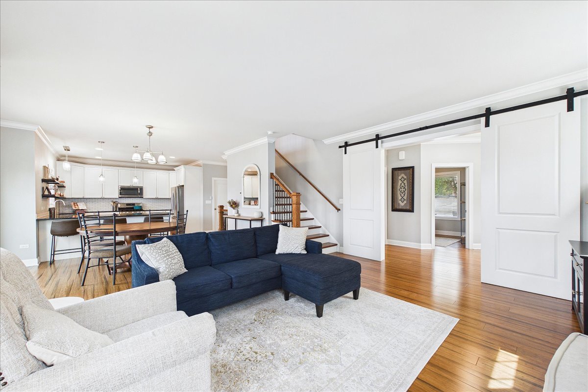 811 Michigan Street Wheaton, IL 60187 - Photo 8 of 33 a living room with furniture and a wooden floor