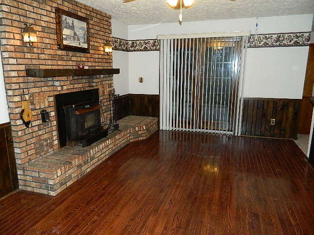 4788 Seven Hills Road Clinton, IL 61727 - Photo 24 of 46 a view of a livingroom with wooden floor