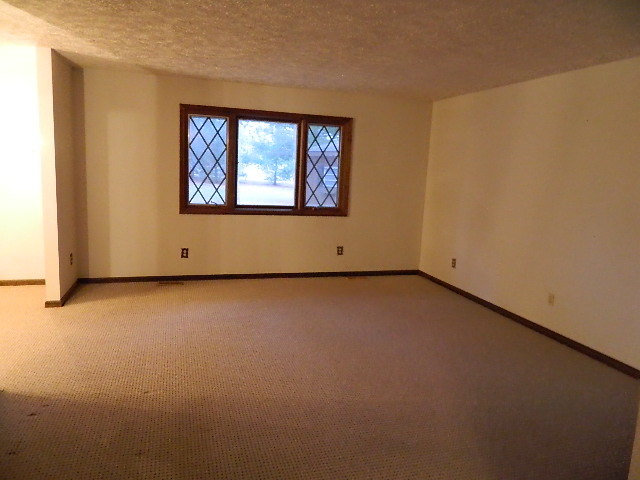 4788 Seven Hills Road Clinton, IL 61727 - Photo 33 of 46 an empty room with a window